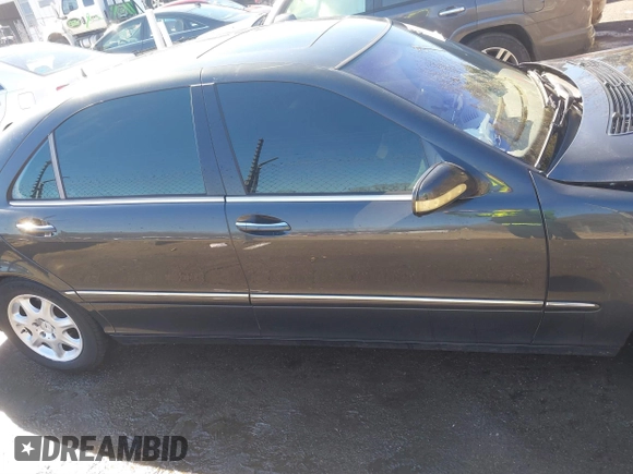 2002 Mercedes-Benz S-Class 4.3L with VIN WDBNG70J42A269648, listed as a IAAI auction lot 41634588 with 141,894 mi miles. Bid and sale history available at carsss.com. Image 13.
