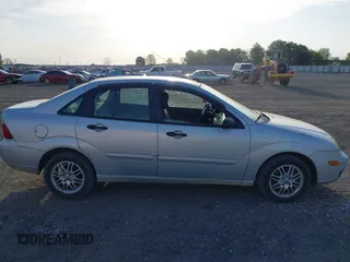 2005 Ford Focus S with VIN 1FAFP34N05W257702, listed as a IAAI auction lot 42023161 with 270,136 mi miles and . Bid and sale history available at carsss.com. Image 13.