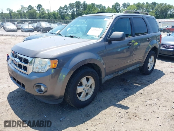 2011 Ford Escape XLT with VIN 1FMCU9D79BKC11522, listed as a IAAI auction lot 42844398 with 223,666 mi miles and . Bid and sale history available at DreamBid. Image 2.