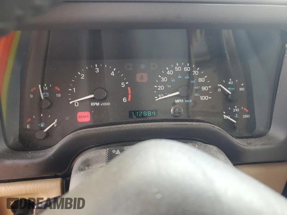 1999 Jeep Wrangler Sahara with VIN 1J4FY49S3XP441051, listed as a Copart auction lot 50946175 with 112,884 mi miles and Salvage Title. Bid and sale history available at carsss.com. Image 9.