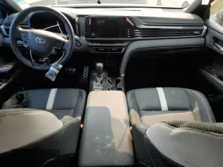 2025 Toyota Camry LE z VIN 4T1DAACK5SU517822, wystawiony jako Copart lot #55895755 z przebiegiem Nie podano mil oraz Szkoda całkowita • Salvage title. Historia ofert i sprzedaży dostępna na DreamBid. Obrazek 8.