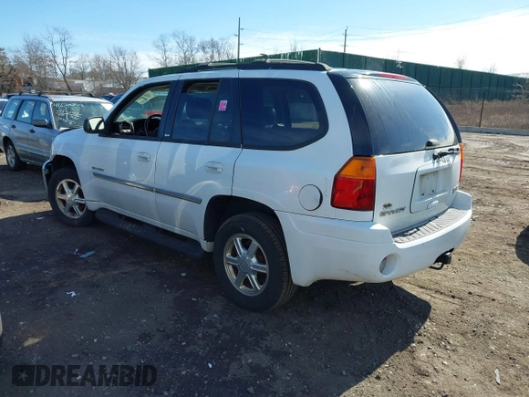 2006 GMC Envoy SLE with VIN 1GKDT13S662355509, listed as a IAAI auction lot 41628732 with 187,635 mi miles. Bid and sale history available at carsss.com. Image 3.