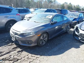 2016 Honda Civic Coupe EX-T with VIN 2HGFC3B35GH359801, listed as a IAAI auction lot 40260451 with 148,782 mi miles. Bid and sale history available at carsss.com. Image 17.
