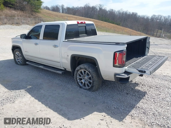 2017 GMC Sierra 1500 Denali with VIN 3GTU2PEC5HG164021, listed as a IAAI auction lot 41784101 with 69,167 mi miles and . Bid and sale history available at DreamBid. Image 3.