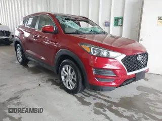 2021 Hyundai Tucson Value with VIN KM8J33A44MU363524, listed as a IAAI auction lot 41854508 with 59,821 mi miles. Bid and sale history available at carsss.com. Image 1.