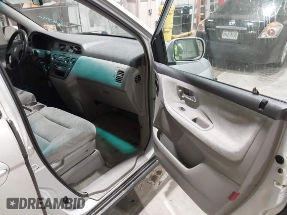 2003 Honda Odyssey EX with VIN 5FNRL18673B009670, listed as a IAAI auction lot 42130172 with 218,391 mi miles and . Bid and sale history available at DreamBid. Image 5.