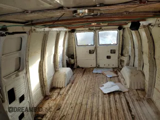 1992 GMC Vandura z VIN 2GTGG39KXN4515226, wystawiony jako Copart lot #85211254 z przebiegiem 594 809 mil mil oraz Szkody całkowita. Historia ofert i sprzedaży dostępna na DreamBid. Obrazek 10.