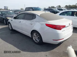 2013 Kia Optima LX with VIN 5XXGM4A79DG193534, listed as a IAAI auction lot 41690584 with 100,287 mi miles. Bid and sale history available at carsss.com. Image 3.