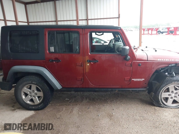 2010 Jeep Wrangler Unlimited Rubicon z VIN 1J4HA6H18AL180628, wystawiony jako IAAI lot #42110357 z przebiegiem 217 940 mil mil oraz . Historia ofert i sprzedaży dostępna na DreamBid. Obrazek 13.