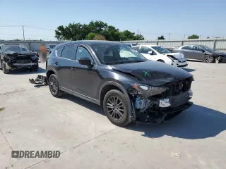 2021 Mazda CX-5 Touring z VIN JM3KFBCM8M0321766, wystawiony jako Copart lot #52845085 z przebiegiem 115 627 mil mil oraz Szkody całkowita. Historia ofert i sprzedaży dostępna na DreamBid. Obrazek 4.