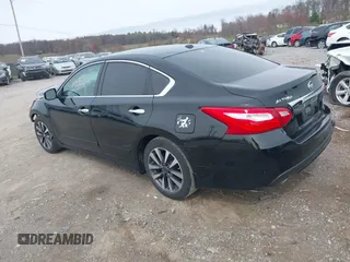 2016 Nissan Altima SR with VIN 1N4AL3AP1GC128738, listed as a IAAI auction lot 41948182 with 156,880 mi miles and . Bid and sale history available at DreamBid. Image 3.