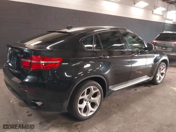 2014 BMW X6 xDrive35i with VIN 5UXFG2C51E0K41841, listed as a IAAI auction lot 41851513 with 79,272 mi miles. Bid and sale history available at carsss.com. Image 4.