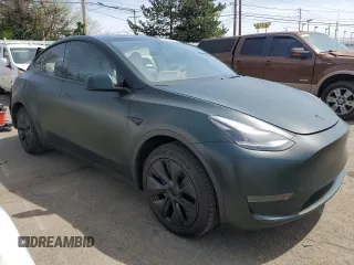 2024 Tesla Model Y z VIN 7SAYGDED4RF206585, wystawiony jako Copart lot #54161715 z przebiegiem 4 228 mil mil oraz Szkoda całkowita • Salvage title. Historia ofert i sprzedaży dostępna na DreamBid. Obrazek 4.