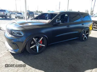2021 Dodge Durango SRT Hellcat z VIN 1C4SDJH99MC818692, wystawiony jako IAAI lot #41070204 z przebiegiem 12 105 mil mil oraz . Historia ofert i sprzedaży dostępna na DreamBid. Obrazek 18.