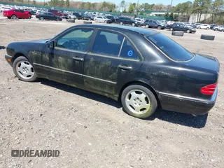 1997 Mercedes-Benz E-Class with VIN WDBJF72F8VA309745, listed as a IAAI auction lot 42119469 with 131,318 mi miles. Bid and sale history available at carsss.com. Image 3.