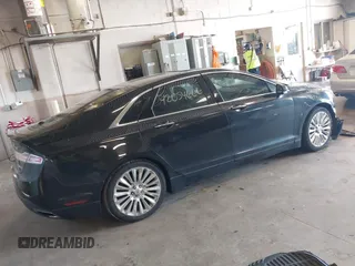2013 Lincoln MKZ z VIN 3LN6L2G94DR823887, wystawiony jako IAAI lot #42054666 z przebiegiem 101 866 mil mil oraz . Historia ofert i sprzedaży dostępna na DreamBid. Obrazek 4.
