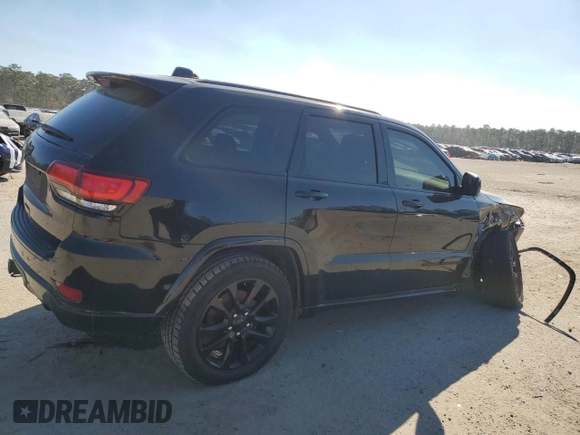2018 Jeep Grand Cherokee Altitude with VIN 1C4RJFAGXJC388535, listed as a Copart auction lot 89369595 with 127,531 mi miles and Salvage title. Bid and sale history available at DreamBid. Image 3.