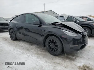 2021 Tesla Model Y Long Range z VIN 5YJYGDEE6MF089008, wystawiony jako Copart lot #45304715 z przebiegiem 140 761 mil mil oraz Szkoda całkowita • Salvage title. Historia ofert i sprzedaży dostępna na DreamBid. Obrazek 4.