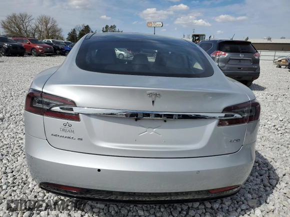 2016 Tesla Model S 90D with VIN 5YJSA1E25GF142104, listed as a Copart auction lot 50874815 with 84,917 mi miles and Salvage Title. Bid and sale history available at DreamBid. Image 6.