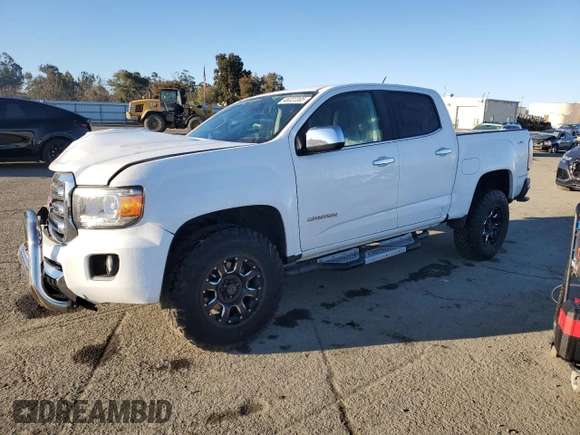 2018 GMC Canyon 4WD SLT z VIN 1GTG6DEN3J1143092, wystawiony jako Copart lot #46322305 z przebiegiem 64 599 mil mil oraz Szkoda całkowita • Salvage title. Historia ofert i sprzedaży dostępna na DreamBid. Obrazek 1.