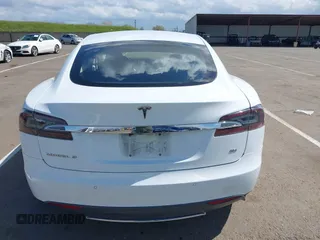 2014 Tesla Model S 60 with VIN 5YJSA1H10EFP56526, listed as a IAAI auction lot 41871784 with 143,361 mi miles and . Bid and sale history available at DreamBid. Image 17.