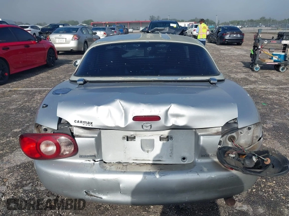 2003 Mazda MX-5 Miata Cloth with VIN JM1NB353730311899, listed as a IAAI auction lot 41929811 with 99,589 mi miles and . Bid and sale history available at DreamBid. Image 16.