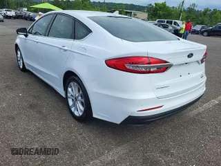 2020 Ford Fusion SE z VIN 3FA6P0LU3LR173414, wystawiony jako IAAI lot #42293327 z przebiegiem 120 068 mil mil oraz . Historia ofert i sprzedaży dostępna na DreamBid. Obrazek 1.