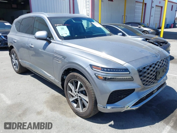 2025 Genesis GV80 z VIN KMUHBESB6SU220535, wystawiony jako IAAI lot #41967009 z przebiegiem 18 484 mil mil oraz . Historia ofert i sprzedaży dostępna na DreamBid. Obrazek 1.