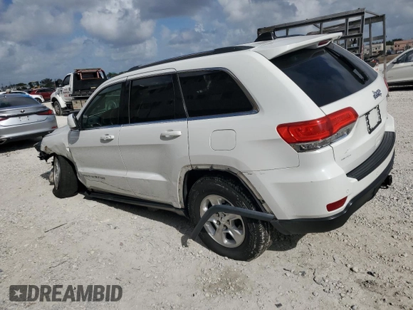 2016 Jeep Grand Cherokee Laredo z VIN 1C4RJEAG6GC390768, wystawiony jako Copart lot #51459885 z przebiegiem 130 690 mil mil oraz Szkoda całkowita • Salvage title. Historia ofert i sprzedaży dostępna na DreamBid. Obrazek 2.