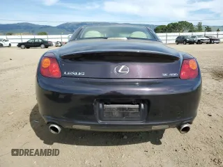 2004 Lexus SC 430 z VIN JTHFN48Y640056039, wystawiony jako Copart lot #48590735 z przebiegiem 117 295 mil mil oraz Szkoda całkowita • Salvage title. Historia ofert i sprzedaży dostępna na DreamBid. Obrazek 6.