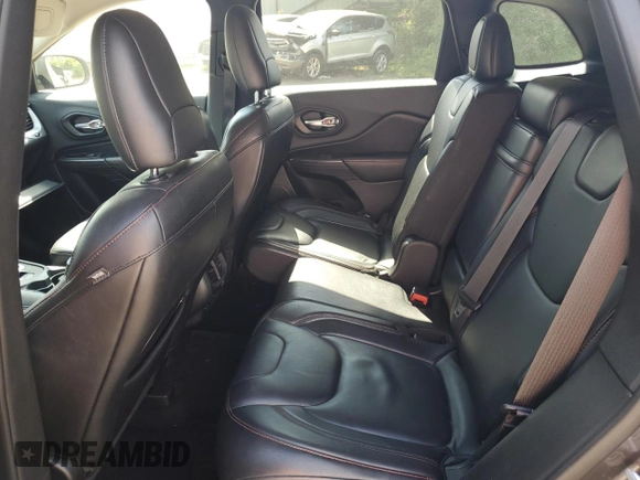 2014 Jeep Cherokee Trailhawk with VIN 1C4PJMBS4EW187085, listed as a Copart auction lot 64106985 with 166,467 mi miles and Clean title. Bid and sale history available at DreamBid. Image 11.
