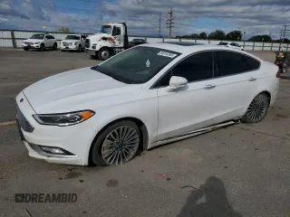 2018 Ford Fusion Titanium с VIN 3FA6P0D94JR247057, выставлен на аукционе Copart как лот 56916365 с пробегом 101 577 миль миль и Списание • Salvage title. История ставок и продаж доступна на DreamBid. Изображение 1.