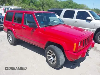 1998 Jeep Cherokee Sport with VIN 1J4FT68S2WL256846, listed as a IAAI auction lot 41998490 with 198,936 mi miles. Bid and sale history available at carsss.com. Image 1.