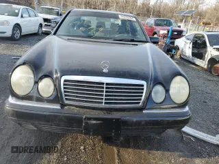 1996 Mercedes-Benz E-Class with VIN WDBJF55F9TJ006471, listed as a Copart auction lot 84835264 with 0 mi miles and Salvage Title. Bid and sale history available at carsss.com. Image 5.