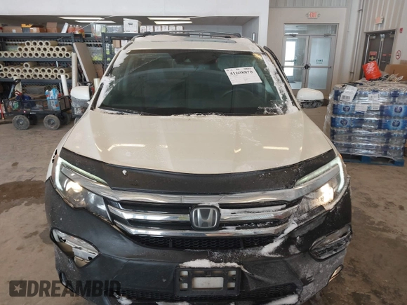 2017 Honda Pilot Touring with VIN 5FNYF6H92HB032873, listed as a IAAI auction lot 41608870 with 123,888 mi miles. Bid and sale history available at carsss.com. Image 12.