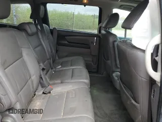 2014 Honda Odyssey Touring z VIN 5FNRL5H91EB063390, wystawiony jako Copart lot #54482545 z przebiegiem Nie podano mil oraz Szkoda całkowita • Salvage title. Historia ofert i sprzedaży dostępna na DreamBid. Obrazek 11.