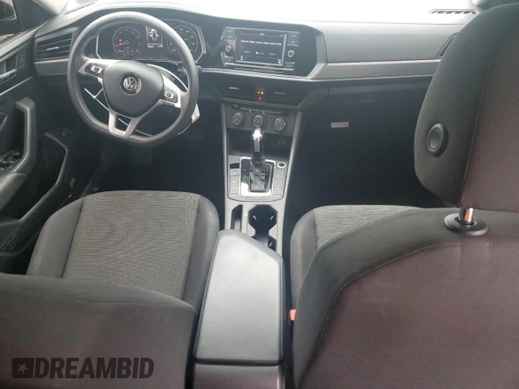 2019 Volkswagen Jetta S with VIN 3VWC57BU7KM128742, listed as a Copart auction lot 58776385 with 128,343 mi miles and Salvage title. Bid and sale history available at DreamBid. Image 8.