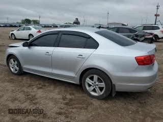 2012 Volkswagen Jetta TDI w/Premium & Nav z VIN 3VWLL7AJ8CM365576, wystawiony jako Copart lot #56728245 z przebiegiem 102 088 mil mil oraz Szkoda całkowita • Salvage title. Historia ofert i sprzedaży dostępna na DreamBid. Obrazek 2.