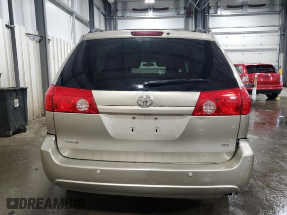 2010 Toyota Sienna XLE with VIN 5TDYK4CC9AS297214, listed as a Copart auction lot 58168805 with 166,970 mi miles and Salvage title. Bid and sale history available at DreamBid. Image 6.
