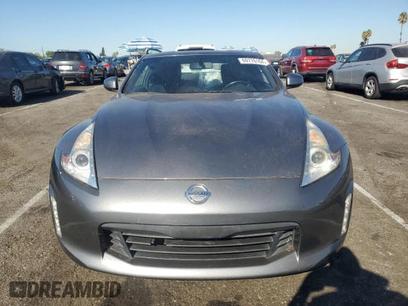 2016 Nissan 370Z with VIN JN1AZ4EH3GM933820, listed as a Copart auction lot 69776164 with 0 mi miles and Salvage Title. Bid and sale history available at carsss.com. Image 5.