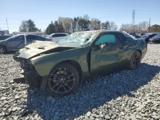 2021 Dodge Challenger R/T Scat Pack Widebody with VIN 2C3CDZFJ8MH526811, listed as a Copart auction lot 50195305 with 34,149 mi miles and Salvage Title. Bid and sale history available at carsss.com. Image 1.