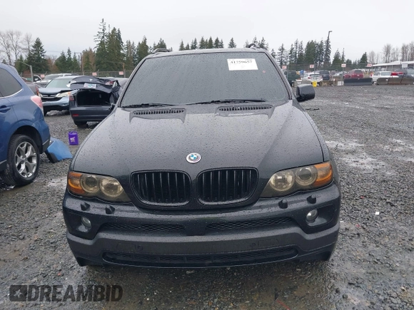 2005 BMW X5 4.8is with VIN 5UXFA93515LE82570, listed as a IAAI auction lot 41759657 with 212,687 mi miles. Bid and sale history available at carsss.com. Image 12.