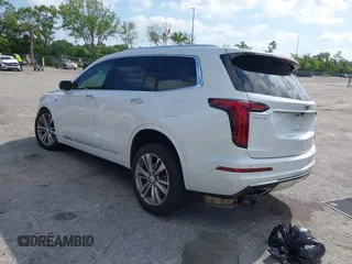 2023 Cadillac XT6 FWD Premium Luxury with VIN 1GYKPCRS3PZ186210, listed as a IAAI auction lot 42290027 with 44,117 mi miles and . Bid and sale history available at DreamBid. Image 3.