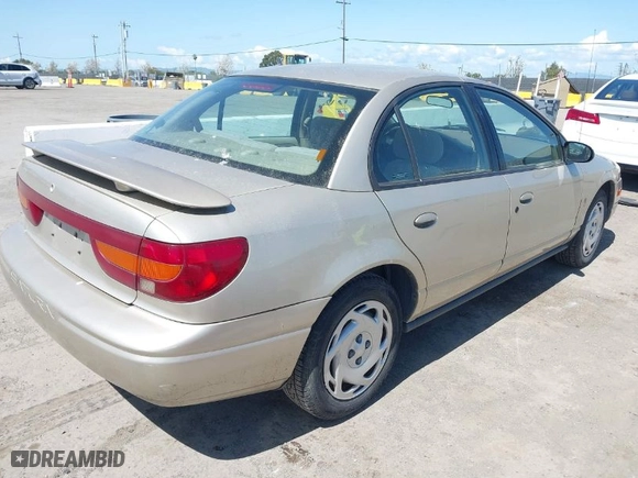 2000 Saturn SL with VIN 1G8ZJ5271YZ256371, listed as a IAAI auction lot 41939885 with 201,860 mi miles. Bid and sale history available at carsss.com. Image 4.
