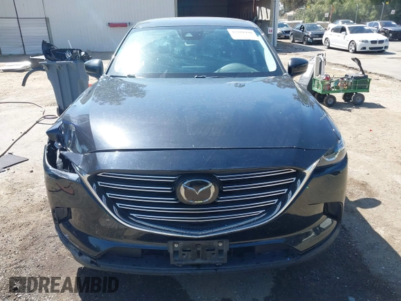 2020 Mazda CX-9 Sport with VIN JM3TCABY8L0407430, listed as a IAAI auction lot 42288490 with 50,317 mi miles and . Bid and sale history available at DreamBid. Image 12.