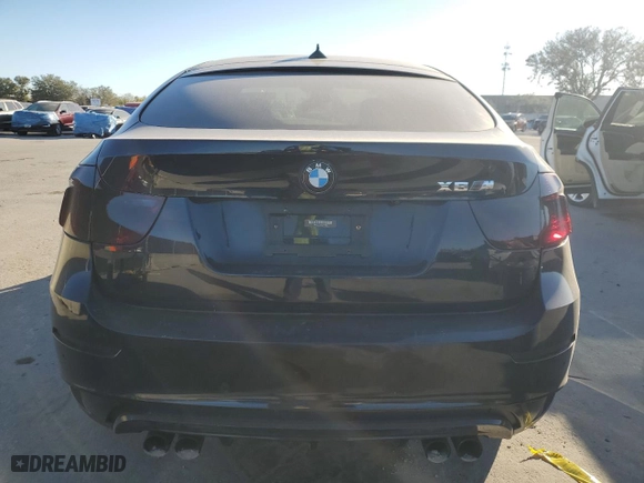 2012 BMW X6 M with VIN 5YMGZ0C59CLK14863, listed as a Copart auction lot 87869855 with 0 mi miles and Salvage Title. Bid and sale history available at carsss.com. Image 6.