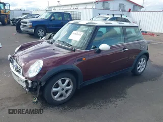 2003 MINI Hardtop with VIN WMWRC33493TC45557, listed as a IAAI auction lot 41868476 with 114,848 mi miles and . Bid and sale history available at DreamBid. Image 2.
