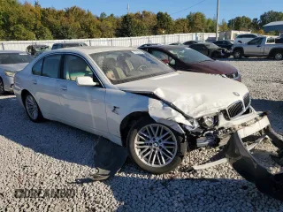 2004 BMW 7 Series 745i with VIN WBAGL63484DP68795, listed as a Copart auction lot 77201084 with 134,044 mi miles and Salvage Title. Bid and sale history available at DreamBid. Image 4.