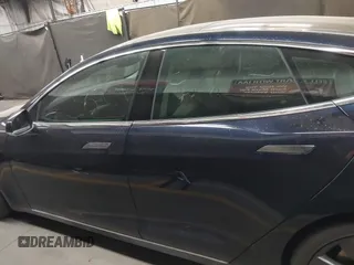 2014 Tesla Model S 60 with VIN 5YJSA1H11EFP56406, listed as a IAAI auction lot 42065157 with Not Provided miles and . Bid and sale history available at DreamBid. Image 14.