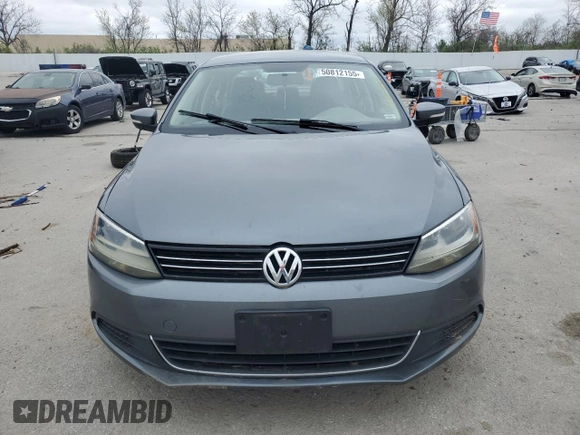 2013 Volkswagen Jetta SE с VIN 3VWDX7AJ5DM311890, выставлен на аукционе Copart как лот 50812155 с пробегом Не указан миль и Списание • Salvage title. История ставок и продаж доступна на DreamBid. Изображение 5.